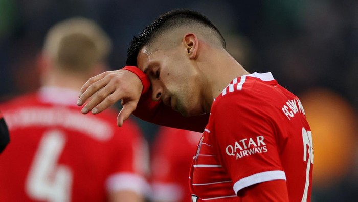 Soccer Football - Bundesliga - Borussia Moenchengladbach v Bayern Munich - Borussia-Park, Moenchengladbach, Germany - February 18, 2023 Bayern Munichs Joao Cancelo looks dejected after the match REUTERS/Thilo Schmuelgen DFL REGULATIONS PROHIBIT ANY USE OF PHOTOGRAPHS AS IMAGE SEQUENCES AND/OR QUASI-VIDEO.