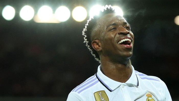 Soccer Football - Champions League - Round of 16 First Leg - Liverpool v Real Madrid - Anfield, Liverpool, Britain - February 21, 2023  Real Madrids Vinicius Junior celebrates scoring their second goal REUTERS/Phil Noble