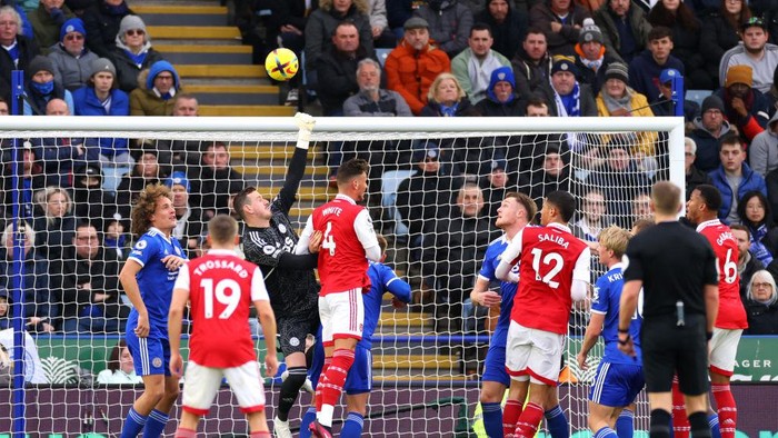 LEICESTER, ENGLAND - FEBRUARY 25: Ben White of Arsenal fouls Danny Ward of Leicester City during the Premier League match between Leicester City and Arsenal FC at The King Power Stadium on February 25, 2023 in Leicester, England. (Photo by Marc Atkins/Getty Images)