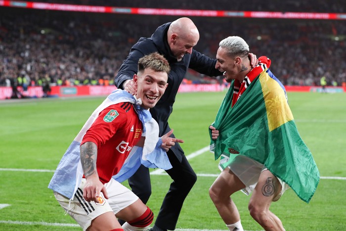 LONDON, ENGLAND - FEBRUARY 26: Manchester United manager Erik ten Hag celebrates victory with Lisandro Martinez and Antony of Manchester United during the Carabao Cup Final match between Manchester United and Newcastle United at Wembley Stadium on February 26, 2023 in London, England. (Photo by Jacques Feeney/Offside/Offside via Getty Images)