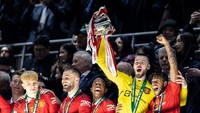 Hasil itu membawa MU juara Carabao Cup sekaligus mengakhiri puasa trofi enam tahun. Foto: CameraSport via Getty Images/Andrew Kearns - CameraSport