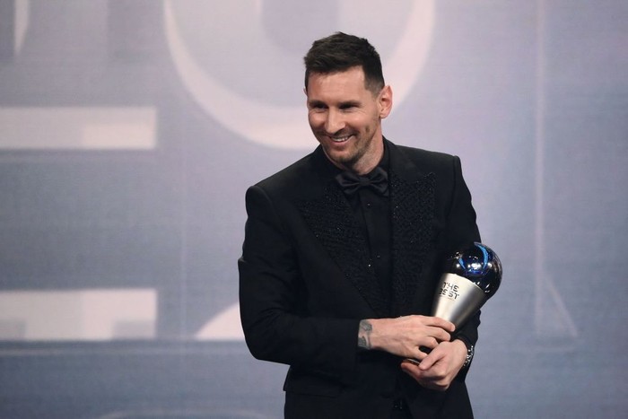Argentina and Paris Saint-Germain forward Lionel Messi poses on stage after receiving the Best FIFA Mens Player award during the Best FIFA Football Awards 2022 ceremony in Paris on February 27, 2023. (Photo by FRANCK FIFE / AFP) (Photo by FRANCK FIFE/AFP via Getty Images)