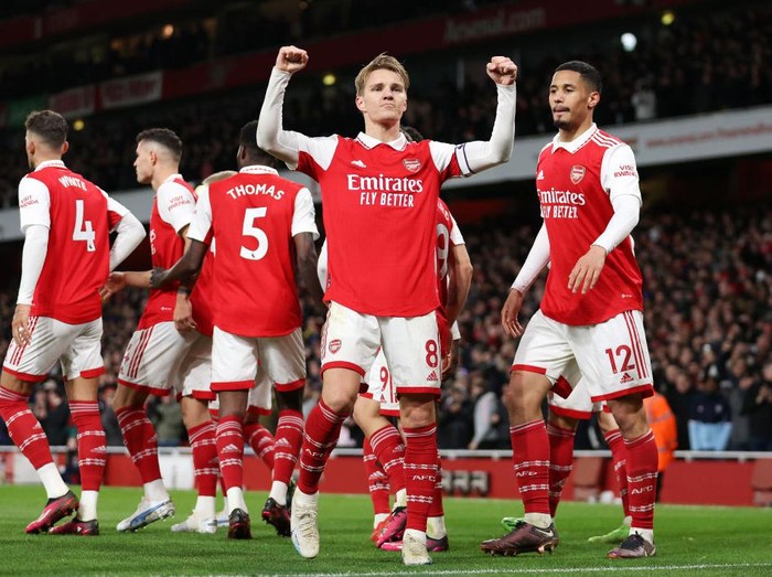 LONDON, ENGLAND - MARCH 01: Martin Odegaard of Arsenal celebrates after scoring the teams third goal during the Premier League match between Arsenal FC and Everton FC at Emirates Stadium on March 01, 2023 in London, England. (Photo by Julian Finney/Getty Images)