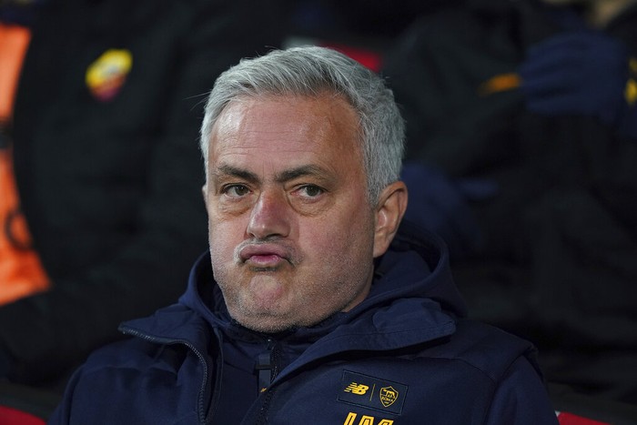 Roma coach Jose Mourinho sits on the bench during the Serie A soccer match between Cremonese and Roma at the Zini Stadium in Cremona, Italy, Tuesday, Feb. 28, 2023. (Spada/LaPresse via AP)