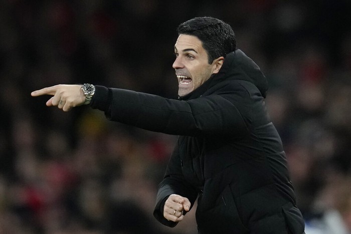 Arsenals manager Mikel Arteta gestures during the English Premier League soccer match between Arsenal and Everton at the Emirates stadium in London, Wednesday, March 1, 2023. (AP Photo/Kirsty Wigglesworth)