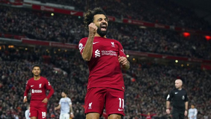 Liverpools Mohamed Salah celebrates scoring his sides second goal during the English Premier League soccer match between Liverpool and Wolverhampton Wanderers at Anfield, Liverpool, England, Wednesday, March 1, 2023. (Peter Byrne/PA via AP)