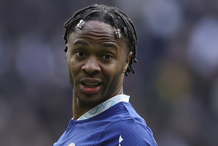 Chelseas Raheem Sterling grimaces during the English Premier League soccer match between Tottenham Hotspur and Chelsea at Tottenham Hotspur Stadium in London, Sunday, Feb. 26, 2023.(AP Photo/Ian Walton)