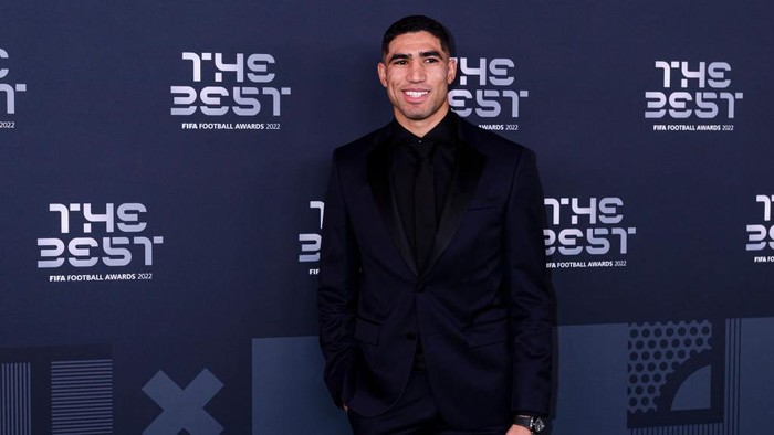 PARIS, FRANCE - FEBRUARY 27: Achraf Hakimi Morocco Football player poses for photos during the Green Carpet Arrivals prior The Best FIFA Football Awards 2022 on February 27, 2023 in Paris, France. (Photo by Marcio Machado/Eurasia Sport Images/Getty Images)