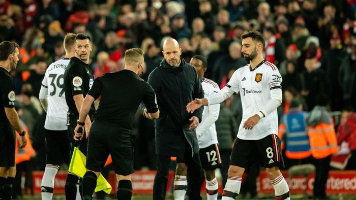 LIVERPOOL, ENGLAND - MARCH 05:  Manchester United Head Coach / Manager Erik ten Hag & Bruno Fernandes of Manchester United react at the end of the Premier League match between Liverpool FC and Manchester United at Anfield on March 5, 2023 in Liverpool, United Kingdom. (Photo by Ash Donelon/Manchester United via Getty Images)