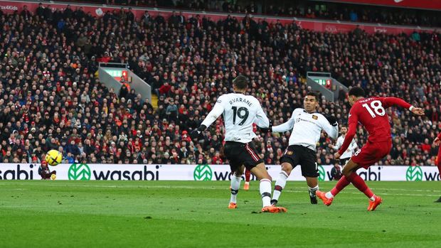 LIVERPOOL, ENGLAND - MARCH 05: Cody Gakpo of Liverpool scores a goal to make it 1-0 during the Premier League match between Liverpool FC and Manchester United at Anfield on March 5, 2023 in Liverpool, United Kingdom. (Photo by Robbie Jay Barratt - AMA/Getty Images)