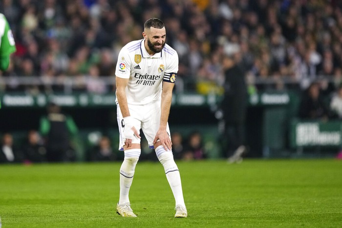 Real Madrids Karim Benzema gestures during the Spanish La Liga soccer match between Real Betis and Real Madrid at the Benito Villamarin stadium in Seville, Spain, Sunday, March 5, 2023. (AP Photo/Jose Breton)