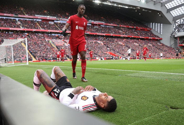 Soccer Football - Premier League - Liverpool v Manchester United - Anfield, Liverpool, Britain - March 5, 2023 Manchester United's Marcus Rashford reacts after sustaining an injury REUTERS/Carl Recine EDITORIAL USE ONLY. No use with unauthorized audio, video, data, fixture lists, club/league logos or 'live' services. Online in-match use limited to 75 images, no video emulation. No use in betting, games or single club /league/player publications.  Please contact your account representative for further details.