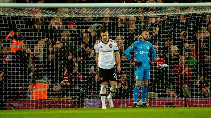 LIVERPOOL, ENGLAND - MARCH 05:  David De Gea  & Diogo Dalot of Manchester United react during the Premier League match between Liverpool FC and Manchester United at Anfield on March 5, 2023 in Liverpool, United Kingdom. (Photo by Ash Donelon/Manchester United via Getty Images)