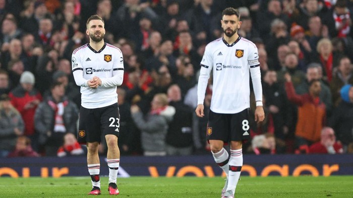 LIVERPOOL, ENGLAND - MARCH 05: Dejected Luke Shaw and Bruno Fernandes of Manchester United after Liverpool scored a goal to make it 2-0 during the Premier League match between Liverpool FC and Manchester United at Anfield on March 5, 2023 in Liverpool, United Kingdom. (Photo by Robbie Jay Barratt - AMA/Getty Images)