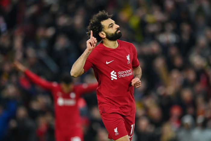 LIVERPOOL, ENGLAND - MARCH 05: Mohamed Salah of Liverpool celebrates after scoring the teams fourth goal during the Premier League match between Liverpool FC and Manchester United at Anfield on March 05, 2023 in Liverpool, England. (Photo by Michael Regan/Getty Images)