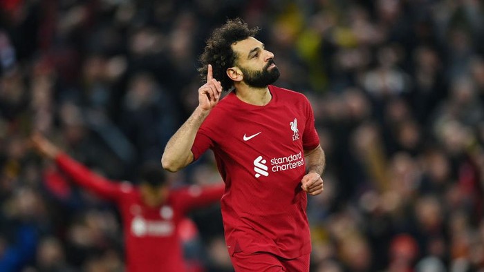 LIVERPOOL, ENGLAND - MARCH 05: Mohamed Salah of Liverpool celebrates after scoring the teams fourth goal during the Premier League match between Liverpool FC and Manchester United at Anfield on March 05, 2023 in Liverpool, England. (Photo by Michael Regan/Getty Images)