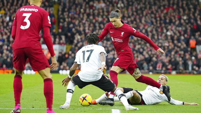 Liverpool's Darwin Nunez runs with the ball during the English Premier League soccer match between Liverpool and Manchester United at Anfield in Liverpool, England, Sunday, March 5, 2023. (AP Photo/Jon Super)