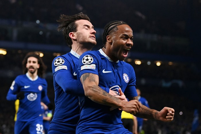 LONDON, ENGLAND - MARCH 07: Raheem Sterling of Chelsea celebrates after scoring the teams first goal with teammate Ben Chilwell during the UEFA Champions League round of 16 leg two match between Chelsea FC and Borussia Dortmund at Stamford Bridge on March 07, 2023 in London, England. (Photo by Darren Walsh/Chelsea FC via Getty Images)