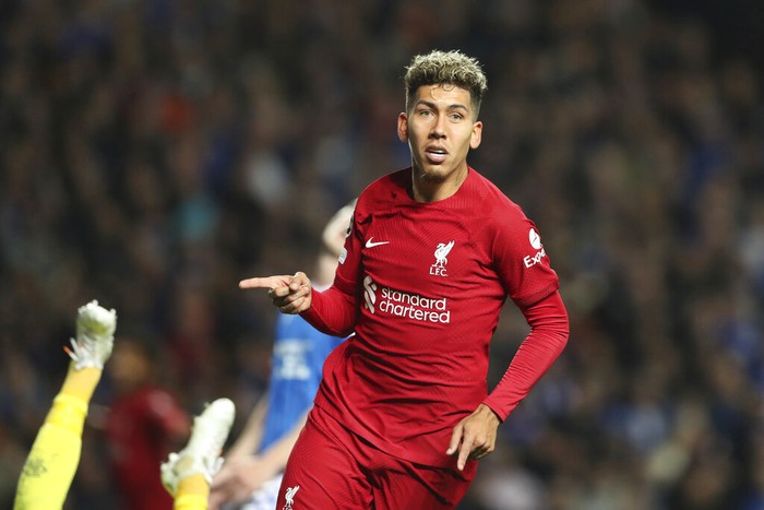 Liverpools Roberto Firmino celebrates after scoring his sides second goal during the Champions League Group A soccer match between Rangers and Liverpool at Ibrox stadium in Glasgow, Scotland, Wednesday, Oct. 12, 2022. (AP Photo/Scott Heppell)