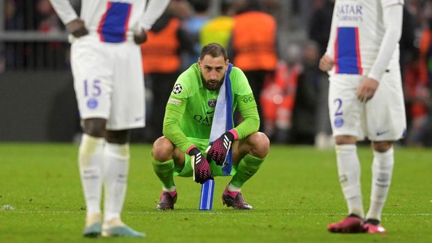 PSG's goalkeeper Gianluigi Donnarumma reacts at the end of the Champions League round of 16 second leg soccer match between Bayern Munich and Paris Saint Germain at the Allianz Arena in Munich, Germany, Wednesday, March 8, 2023. Bayern Munich won 2-0. (AP Photo/Andreas Schaad)