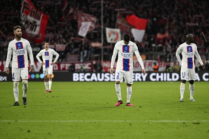 PSGs players leave the field at the end of the Champions League round of 16 second leg soccer match between Bayern Munich and Paris Saint Germain at the Allianz Arena in Munich, Germany, Wednesday, March 8, 2023. Bayern Munich won 2-0. (AP Photo/Andreas Schaad)