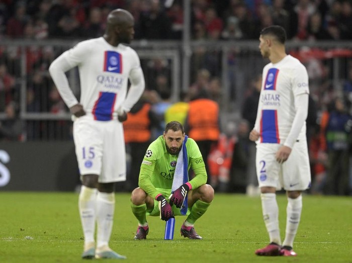 PSG's goalkeeper Gianluigi Donnarumma reacts at the end of the Champions League round of 16 second leg soccer match between Bayern Munich and Paris Saint Germain at the Allianz Arena in Munich, Germany, Wednesday, March 8, 2023. Bayern Munich won 2-0. (AP Photo/Andreas Schaad)
