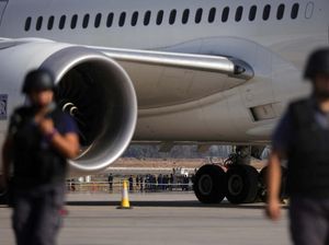 Aksi Baku Tembak Perampok dan Polisi di Bandara Santiago