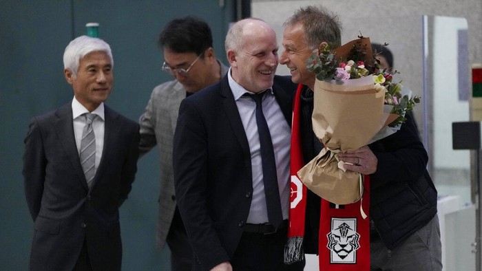 South Korea's new national soccer team head coach Jurgen Klinsmann leaves after a press conference at the Incheon International Airport in Incheron, South Korea, Wednesday, March 8, 2023. Klinsmann, who won the World Cup as a player with West Germany in 1990, replaces Paulo Bento. The Portuguese coach left the team after leading South Korea to the second round at last year's World Cup in Qatar. (AP Photo/Ahn Young-joon)