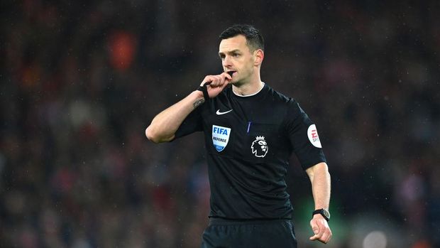 LIVERPOOL, ENGLAND - MARCH 05: Referee Andy Madley looks on during the Premier League match between Liverpool FC and Manchester United at Anfield on March 05, 2023 in Liverpool, England. (Photo by Michael Regan/Getty Images)