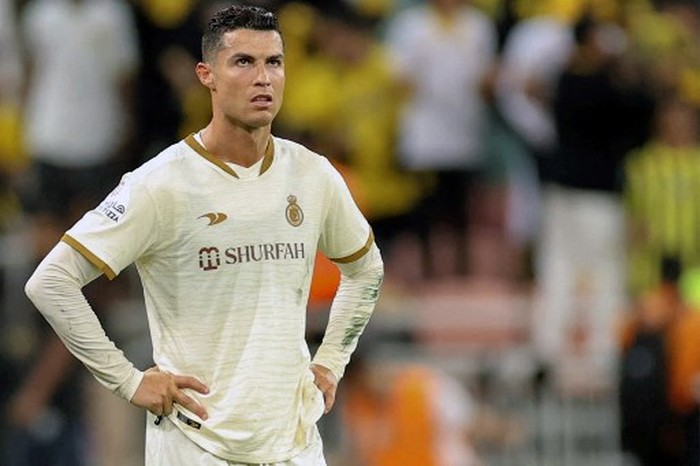 Nassrs Portuguese forward Cristiano Ronaldo reacts during the Saudi Pro League football match between al-Ittihad and al-Nassr at King Abdullah Sport City Stadium in Jeddah on March 9, 2023. (Photo by AFP)