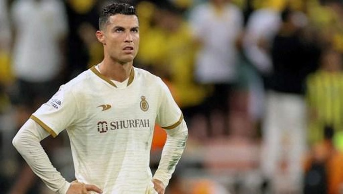 Nassrs Portuguese forward Cristiano Ronaldo reacts during the Saudi Pro League football match between al-Ittihad and al-Nassr at King Abdullah Sport City Stadium in Jeddah on March 9, 2023. (Photo by AFP)