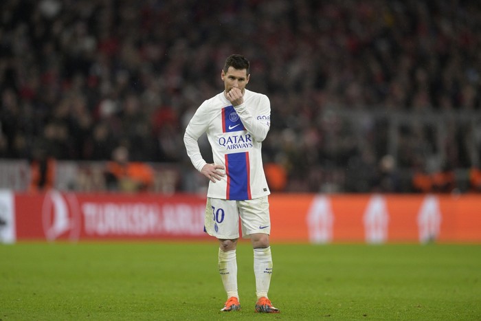 PSG's Lionel Messi stands on the field during the Champions League round of 16 second leg soccer match between Bayern Munich and Paris Saint Germain at the Allianz Arena in Munich, Germany, Wednesday, March 8, 2023. (AP Photo/Andreas Schaad)