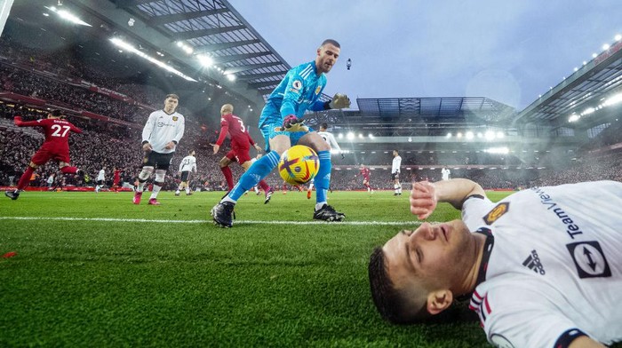 Liverpools Darwin Nunez celebrates scoring their sides fifth goal of the game as Manchester Uniteds Diogo Dalot lays on the floor during the Premier League match at Anfield, Liverpool. Picture date: Sunday March 5, 2023. (Photo by Peter Byrne/PA Images via Getty Images)