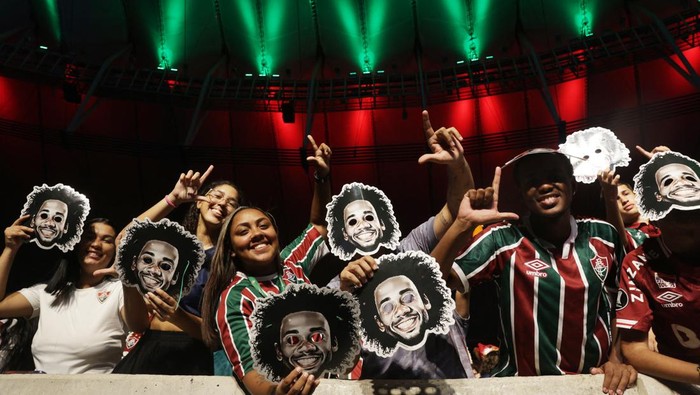Soccer Football - Marcelo signs for Fluminense - Maracana Stadium, Rio de Janeiro, Brazil - March 10, 2023 Fans wearing Marcelo cardboard masks are seen at the stadium before Marcelo's presentation REUTERS/Pilar Olivares