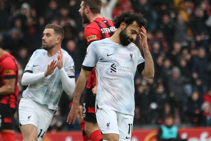 Liverpool's Egyptian striker Mohamed Salah reacts after missing his penalty kick during the English Premier League football match between Bournemouth and Liverpool at the Vitality Stadium in Bournemouth, southern England on March 11, 2023. (Photo by Steve Bardens / AFP) / RESTRICTED TO EDITORIAL USE. No use with unauthorized audio, video, data, fixture lists, club/league logos or 'live' services. Online in-match use limited to 120 images. An additional 40 images may be used in extra time. No video emulation. Social media in-match use limited to 120 images. An additional 40 images may be used in extra time. No use in betting publications, games or single club/league/player publications. /  (Photo by STEVE BARDENS/AFP via Getty Images)