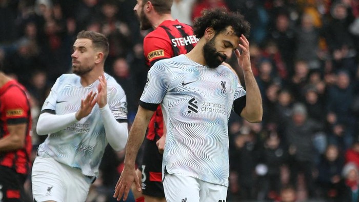 Liverpools Egyptian striker Mohamed Salah reacts after missing his penalty kick during the English Premier League football match between Bournemouth and Liverpool at the Vitality Stadium in Bournemouth, southern England on March 11, 2023. (Photo by Steve Bardens / AFP) / RESTRICTED TO EDITORIAL USE. No use with unauthorized audio, video, data, fixture lists, club/league logos or live services. Online in-match use limited to 120 images. An additional 40 images may be used in extra time. No video emulation. Social media in-match use limited to 120 images. An additional 40 images may be used in extra time. No use in betting publications, games or single club/league/player publications. /  (Photo by STEVE BARDENS/AFP via Getty Images)