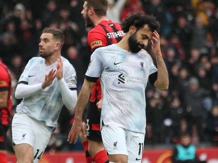 Liverpool's Egyptian striker Mohamed Salah reacts after missing his penalty kick during the English Premier League football match between Bournemouth and Liverpool at the Vitality Stadium in Bournemouth, southern England on March 11, 2023. (Photo by Steve Bardens / AFP) / RESTRICTED TO EDITORIAL USE. No use with unauthorized audio, video, data, fixture lists, club/league logos or 'live' services. Online in-match use limited to 120 images. An additional 40 images may be used in extra time. No video emulation. Social media in-match use limited to 120 images. An additional 40 images may be used in extra time. No use in betting publications, games or single club/league/player publications. /  (Photo by STEVE BARDENS/AFP via Getty Images)
