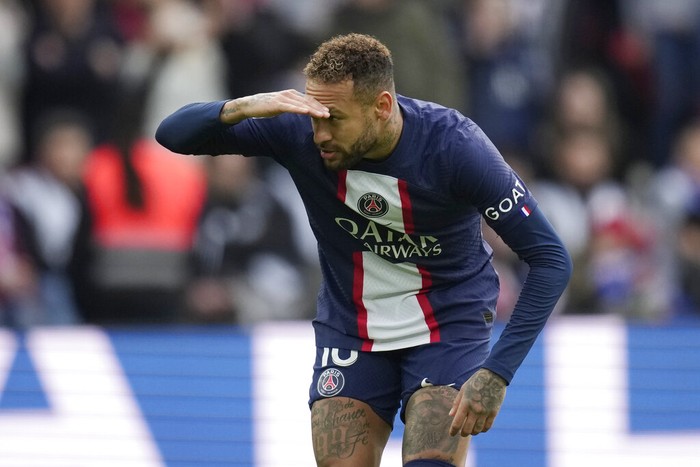 PSGs Neymar celebrates after scoring his sides second goal during the French League One soccer match between Paris Saint-Germain and Lille at the Parc des Princes stadium, in Paris, France, Sunday, Feb. 19, 2023. (AP Photo/Christophe Ena)