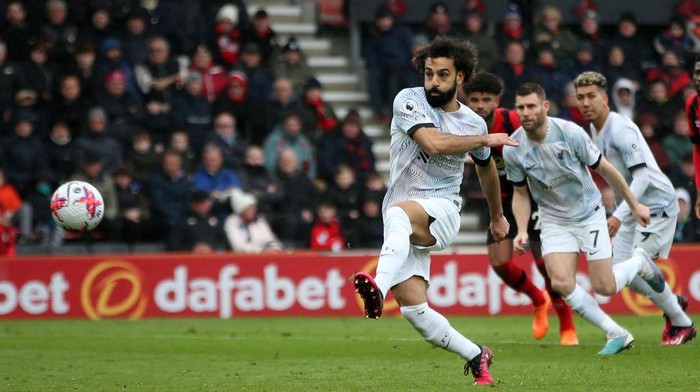 Liverpools Egyptian striker Mohamed Salah hits this penalty kick wide of the Bournemouth goal during the English Premier League football match between Bournemouth and Liverpool at the Vitality Stadium in Bournemouth, southern England on March 11, 2023. (Photo by Steve Bardens / AFP) / RESTRICTED TO EDITORIAL USE. No use with unauthorized audio, video, data, fixture lists, club/league logos or live services. Online in-match use limited to 120 images. An additional 40 images may be used in extra time. No video emulation. Social media in-match use limited to 120 images. An additional 40 images may be used in extra time. No use in betting publications, games or single club/league/player publications. /  (Photo by STEVE BARDENS/AFP via Getty Images)