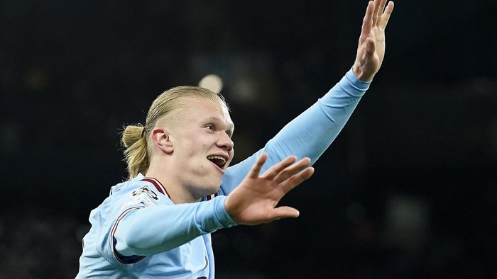 Manchester Citys Erling Haaland reacts after he scored his 5th goal, the 6-0, during the Champions League round of 16 second leg soccer match between Manchester City and RB Leipzig at the Etihad stadium in Manchester, England, Tuesday, March 14, 2023. (AP Photo/Dave Thompson)