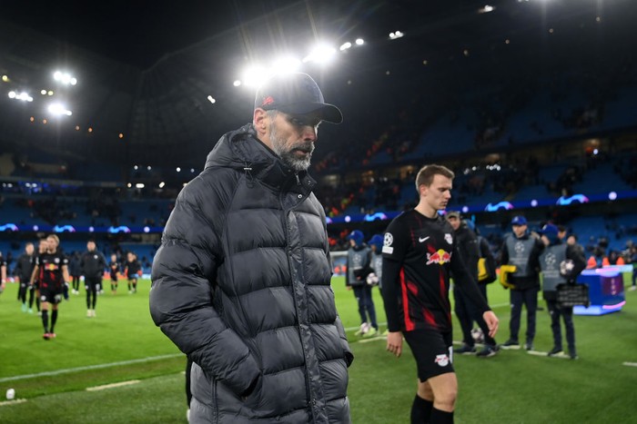 MANCHESTER, ENGLAND - MARCH 14: Marco Rose, Head Coach of RB Leipzig, looks dejected as they leave the pitch after their sides defeat in the UEFA Champions League round of 16 leg two match between Manchester City and RB Leipzig at Etihad Stadium on March 14, 2023 in Manchester, England. (Photo by Michael Regan - UEFA/UEFA via Getty Images)