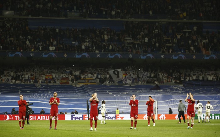 Soccer Football - Champions League - Round of 16 - Second Leg - Real Madrid v Liverpool - Santiago Bernabeu, Madrid, Spain - March 15, 2023 Liverpool players look dejected after the match REUTERS/Juan Medina
