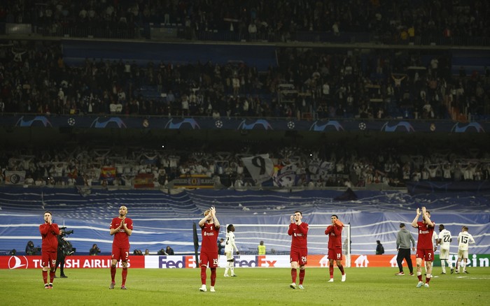 Liverpool Soccer Football - Champions League - Round of 16 - Second Leg - Real Madrid v Liverpool - Santiago Bernabeu, Madrid, Spain - March 15, 2023 Liverpool players look dejected after the match REUTERS/Juan Medina