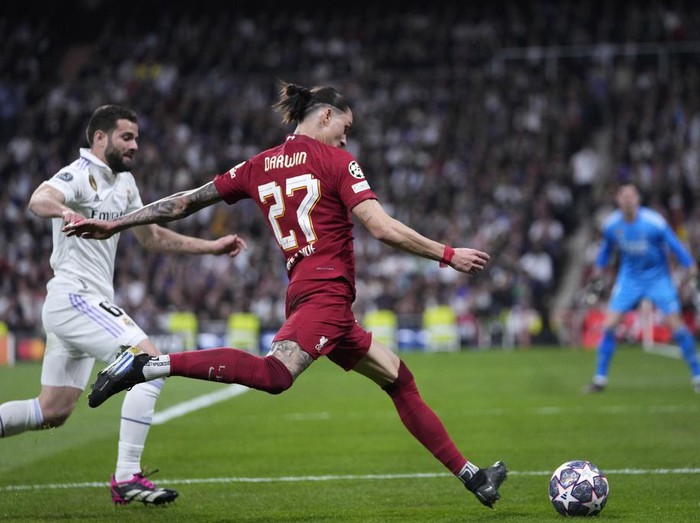Liverpool's Darwin Nunez kicks the ball during the Champions League, round of 16, second leg soccer match between Real Madrid and Liverpool at the Santiago Bernabeu stadium in Madrid, Spain, Wednesday, March 15, 2023. (AP Photo/Bernat Armangue)