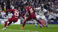 Liverpool melawat ke Santiago Bernabeu, Kamis (16/3/2023) dini hari WIB pada leg kedua 16 besar Liga Champions dalam posisi terjepit. Si Merah ketinggalan 2-5 usai kalah di Anfield pada laga pertama. AP/Manu Fernandez  