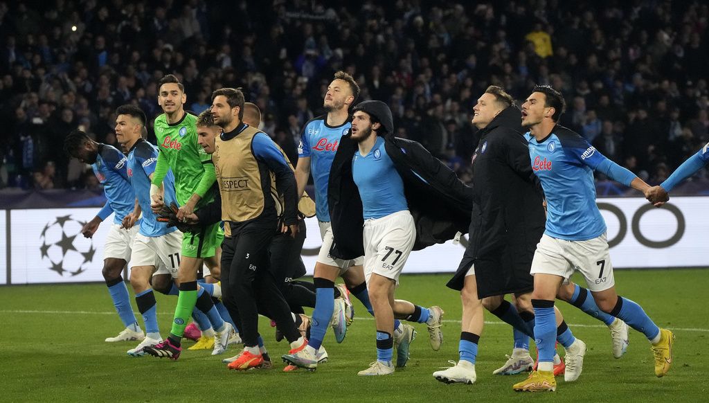 Napoli's players celebrate after winning the Champions League round of 16 second leg soccer match between SSC Napoli and Eintracht Frankfurt at the Diego Armando Maradona stadium in Naples, Italy, Wednesday, March 15, 2023. (AP Photo/Gregorio Borgia)