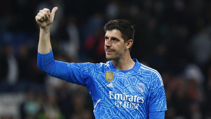 Soccer Football - Champions League - Round of 16 - Second Leg - Real Madrid v Liverpool - Santiago Bernabeu, Madrid, Spain - March 15, 2023 Real Madrids Thibaut Courtois celebrates after the match REUTERS/Susana Vera