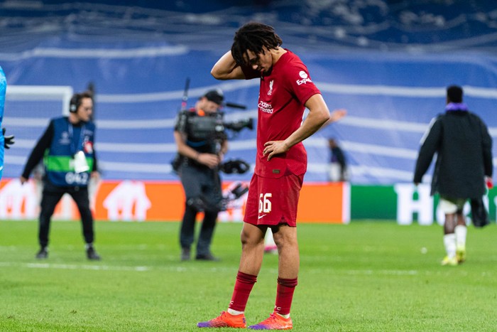 MADRID, SPAIN - MARCH 15: Trent Alexander-Arnold of Liverpool reacts after Liverpool was defeated by Madrid during the UEFA Champions League round of 16 leg two match between Real Madrid and Liverpool FC at Estadio Santiago Bernabeu on March 15, 2023 in Madrid, Spain. (Photo by Alvaro Medranda/Eurasia Sport Images/Getty Images)