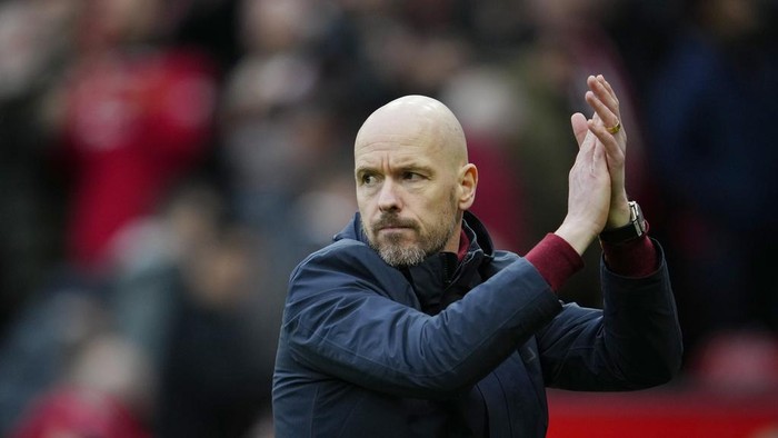 Manchester Uniteds head coach Erik ten Hag walks on the pitch at the end of the English Premier League soccer match between Manchester United and Southampton at Old Trafford stadium in Manchester, England, Sunday, March 12, 2023. (AP Photo/Jon Super)