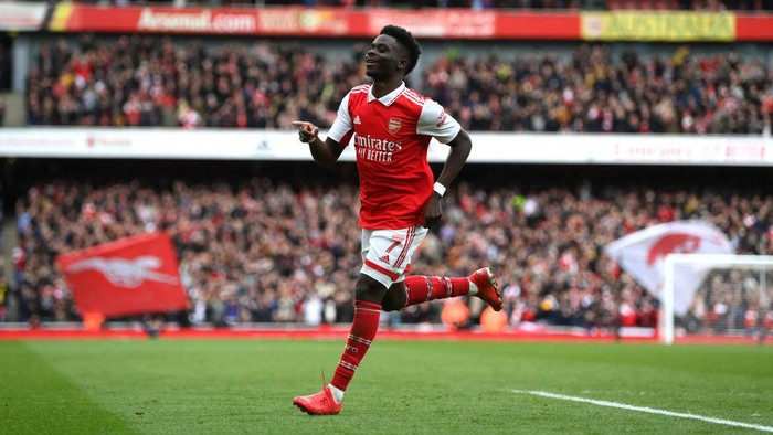 LONDON, ENGLAND - MARCH 19: Bukayo Saka of Arsenal celebrates after scoring the teams second goal during the Premier League match between Arsenal FC and Crystal Palace at Emirates Stadium on March 19, 2023 in London, England. (Photo by Shaun Botterill/Getty Images)
